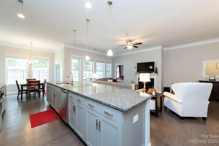 Kitchen featuring granite counter tops & stainless appliances