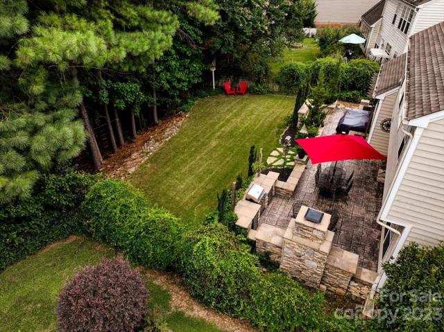 private backyard with large patio overlooking a private yard.