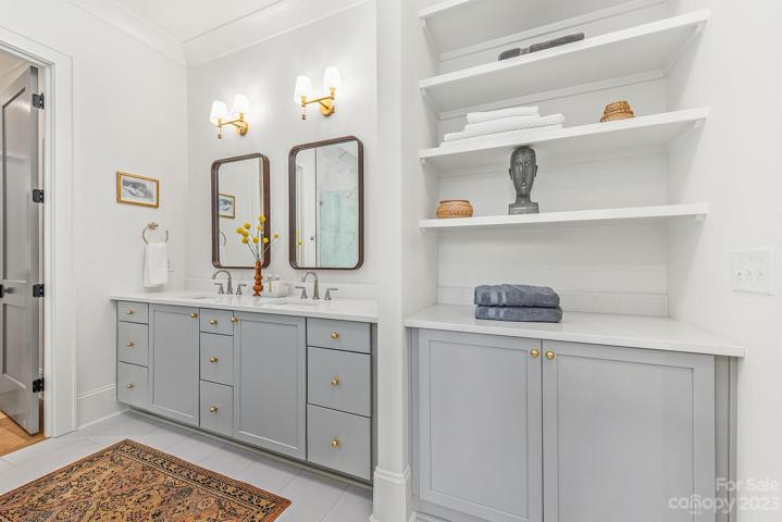 Primary bathroom with walk in shower and garden tub