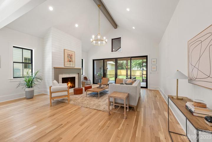 Family room with gas fireplace and vaulted ceilings