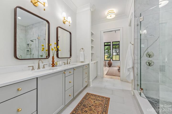 Primary bathroom with walk in shower and garden tub