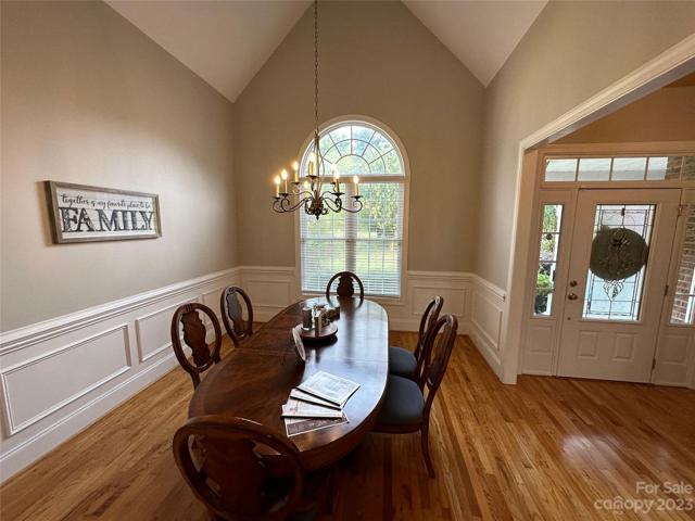 Another view of the formal dining room - custom picture molding and a lot of natural light!