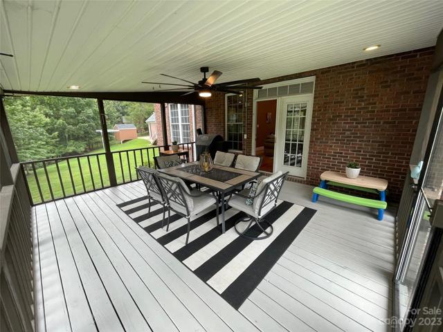This screened in porch is so nice and you can unwind and relax after a hard day at work.  You will enjoy having dinner or drinks in the evening looking over your private tree-lined yard.