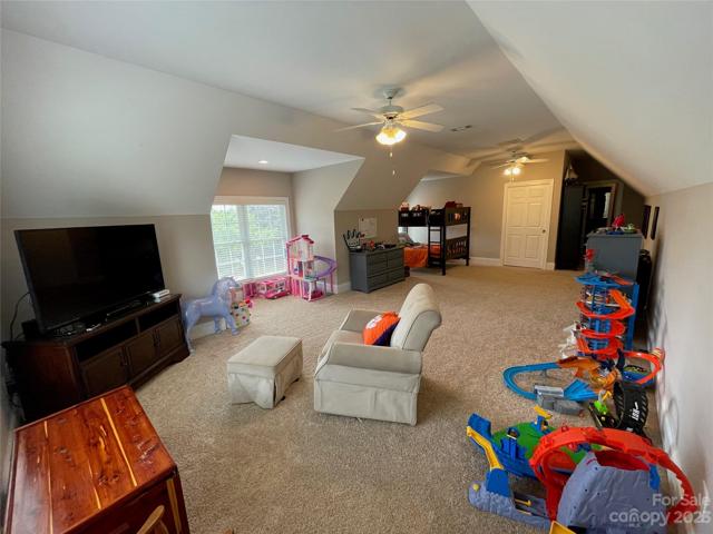 Another view of the enormous bonus/bedroom upstairs.  You can get really creative with this space.  The double windows even in the doomers make for a bright and airy space.