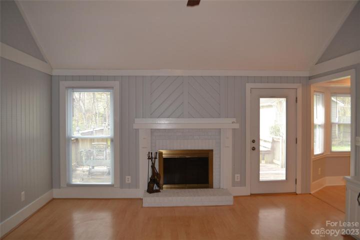 Family room with wood fireplace