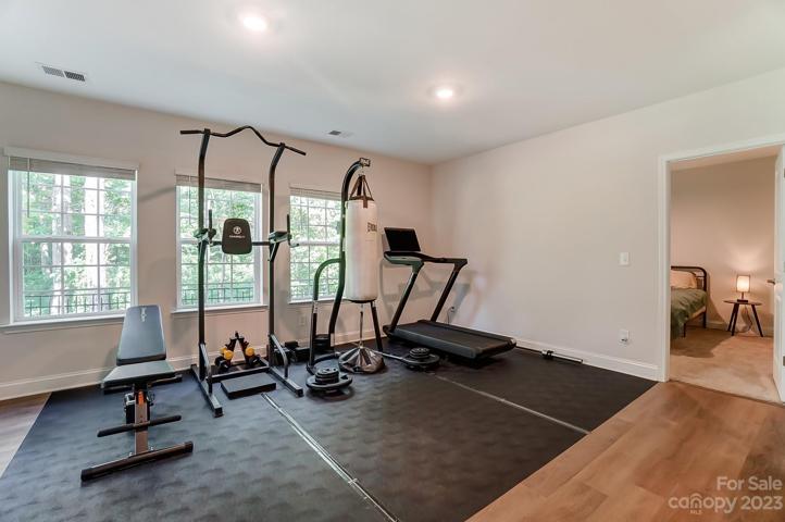 Finished basement flex space, used as home gym