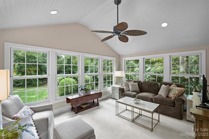 Sunroom with vaulted ceiling