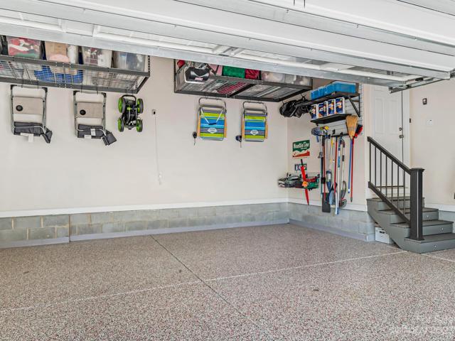 3-car garage w/epoxied flrs, 2-car w/overhead storage