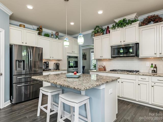 1st Flr - Kitchen, Coffee bar, 5-burner gas cooktop, lots of cabinets  w/soft close.