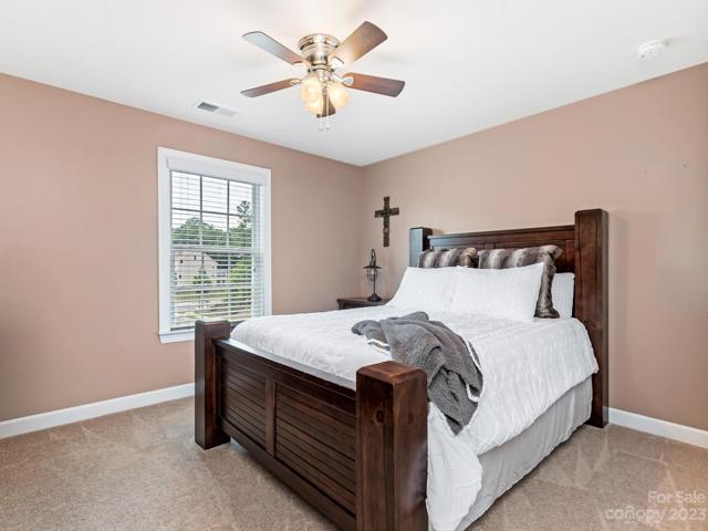 2nd Flr - secondary bedroom (4), ceiling fan, w/shared bath (faces front of house)