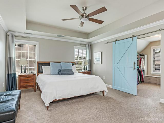 2nd Flr - Primary Suite w/tray ceiling, in-ceiling speakers, lg custom (2nd) WIC w/cabinets, barn door