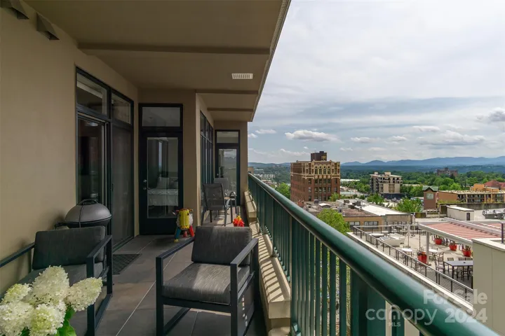 Access to the balcony from both bedrooms.