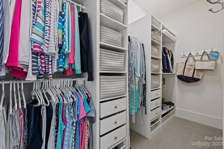 Separate his and hers custom closets