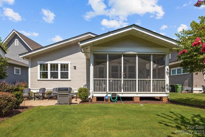 Relax in your back screened porch