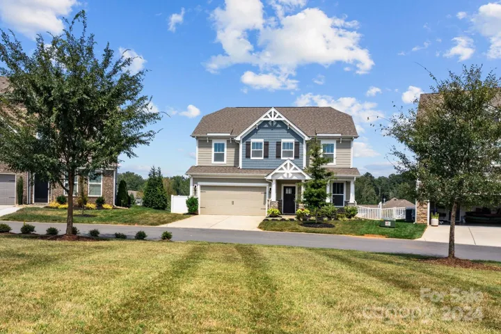 Large open grass area in front of home