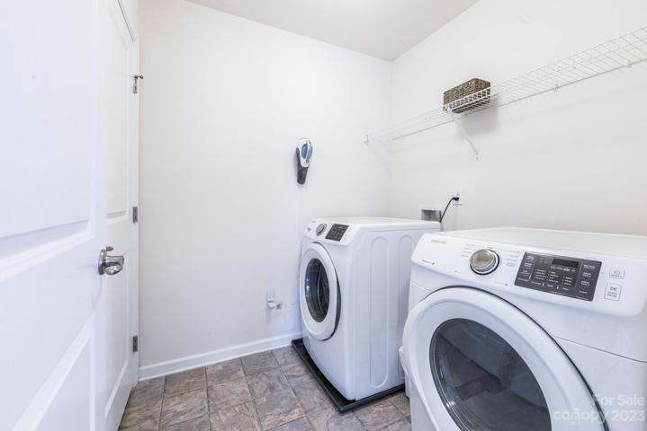 laundry room has a storage closet