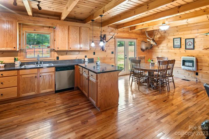 Gleaming oak floors, pine walls and beautiful oak cabinets.