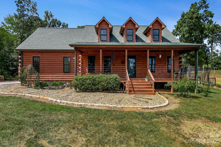 This custom built home has it all and sits on 2.21 acres.(additional approx. 5 acres can be purchased)