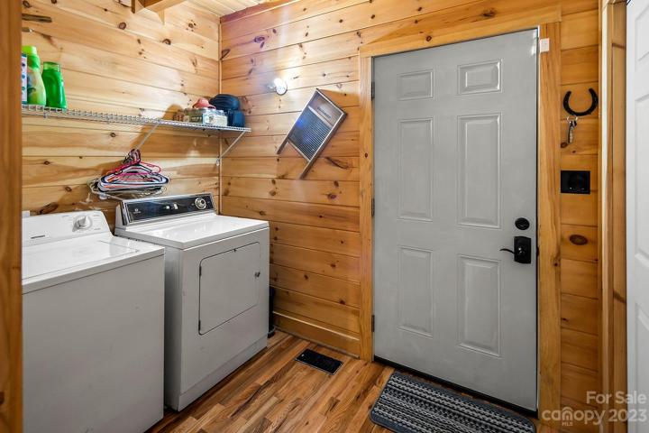 Laundry room and additional storage on the main level.