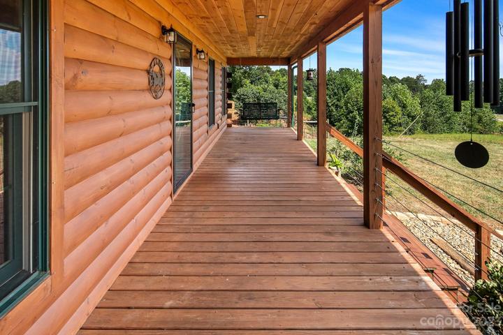 Enjoy endless views on this rocking chair front porch!