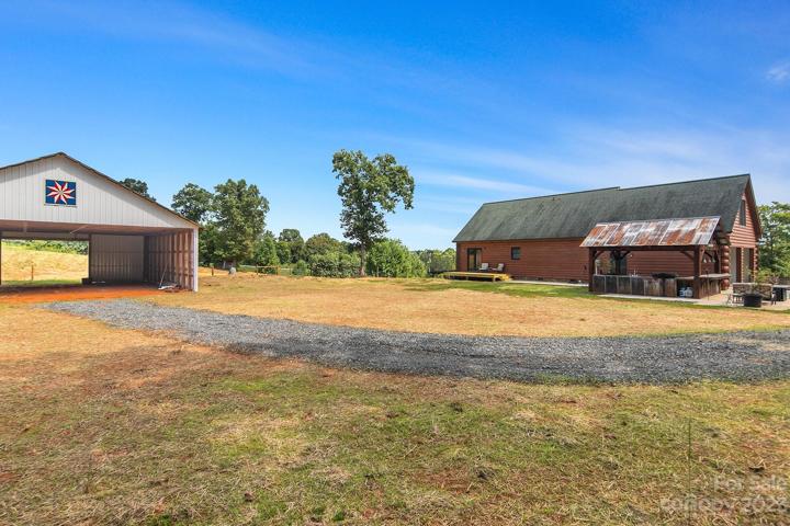 40 x 44 open-air pole barn and full outdoor kitchen