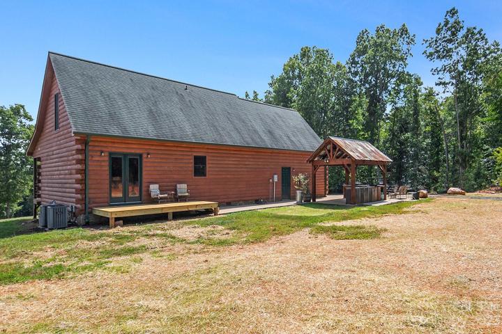 Backyard features a new deck and custom outdoor kitchen.