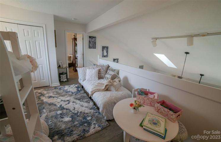 The loft leads into the second bedroom.
