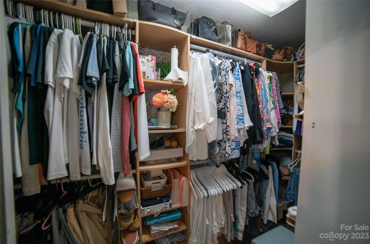 Primary walk in closet.