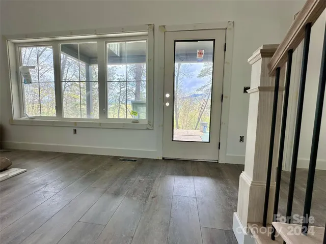 great room looks to deck and Mtn views
