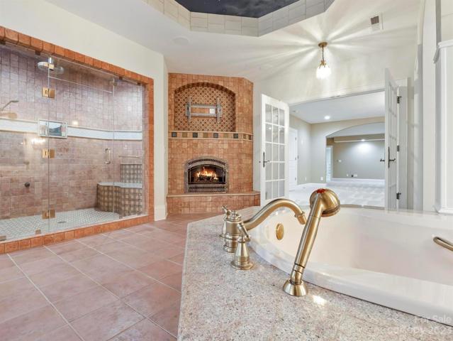 primary bath with gas logs