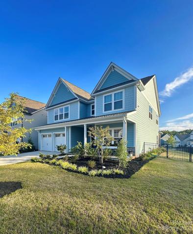 True Homes 2022 Build.  Like new, corner, fenced lot in gated lake front community.