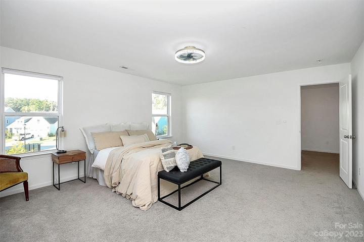 HUGE primary bedroom at end of hall makes for private, relaxing space!