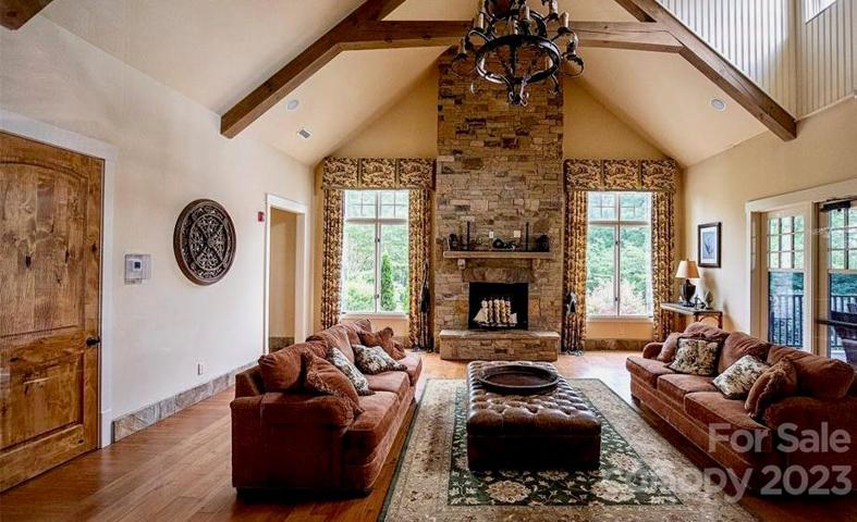 2 comfortable gathering locations at clubhouse overlooking lake