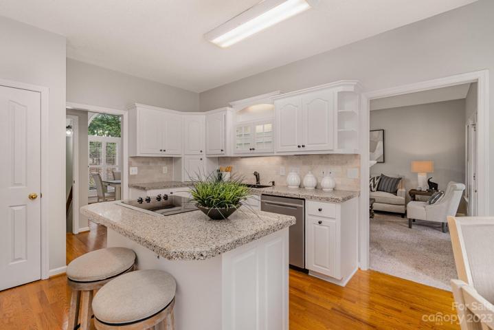 Freshly painted kitchen where natural light abounds.