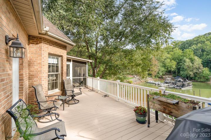 Upper-level deck off the primary suite perfect for hosting.
