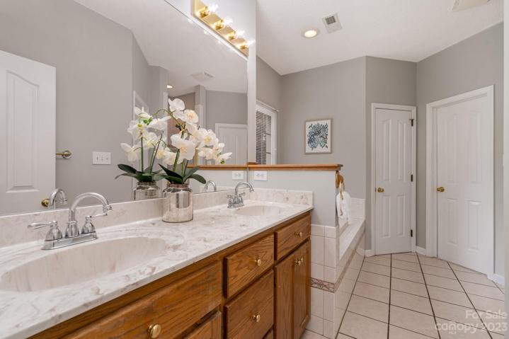 Main level primary suite with Lake Norman views.
