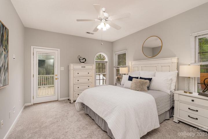 Main level primary suite with Lake Norman views.