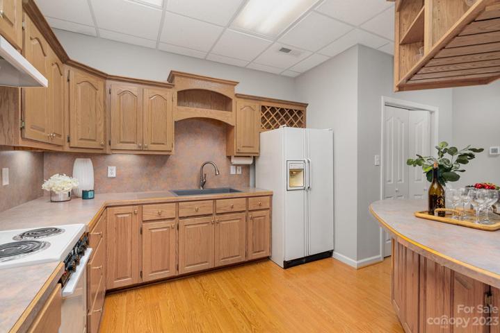 Lower-level serves as a second living quarters, perfect for hosting, or multi-generational needs.