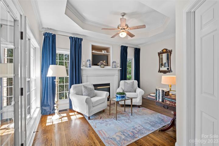This space can be anything your lifestyle desires: an office space, a reading room, a yoga room or maybe a gym, all within your own private space.  This room is full of light, features a gas log fire place (gas logs are new, 2021), tray ceiling, hardwood floors throughout and floor to ceiling windows.