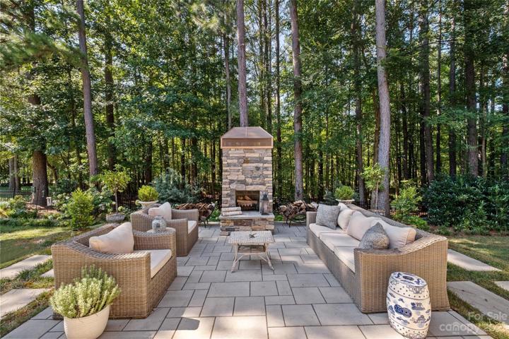 Back yard patio and Fire Place, built in 2022.  Peaceful and beautiful.