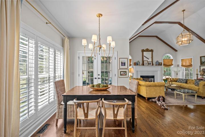 Kitchen and dining area effortlessly flow into an open an inviting Family Room. (Dog is not for sale) :)