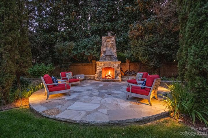 Gas starting wood burning outdoor fireplace.