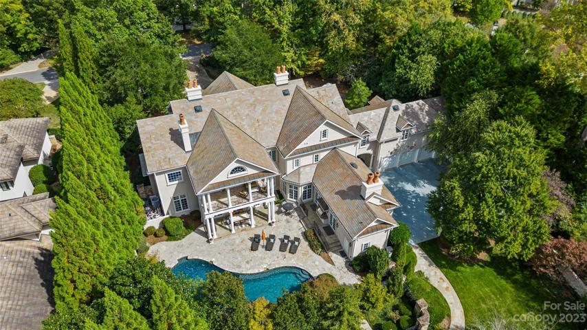 Located on a picturesque private 1.1 acre lot in the exclusive gated community, Morrocroft Estates, 4424 Fox Brook Lane is a one-of-a-kind estate featuring 9,149 square feet, 6 bedrooms, 8 full & 2 half bathrooms with 5 fireplaces.