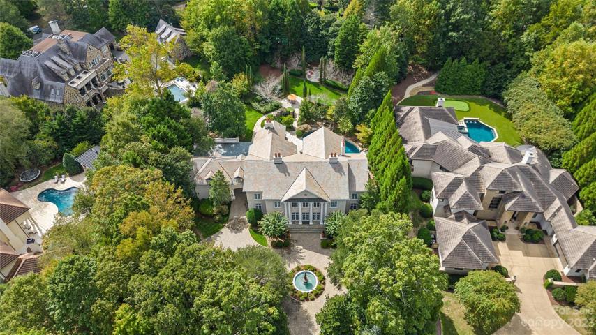 Located on a picturesque private 1.1 acre lot in the exclusive gated community, Morrocroft Estates, 4424 Fox Brook Lane is a one-of-a-kind estate featuring 9,149 square feet, 6 bedrooms, 8 full & 2 half bathrooms with 5 fireplaces.