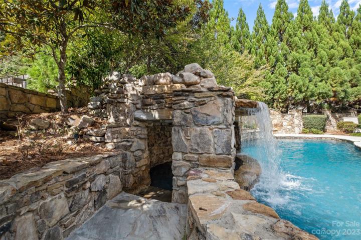 Resort style pool with grotto spa.