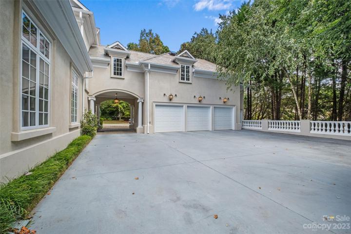 Porte-cochere leads you to the 3 car garage with ample parking.