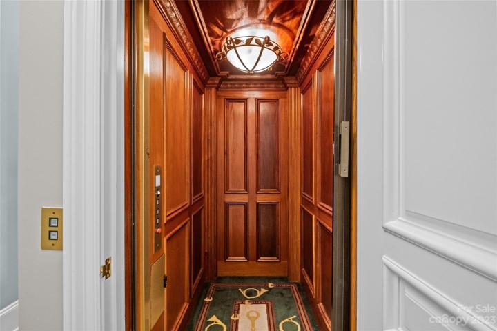 Elevator with incredible wood detail.