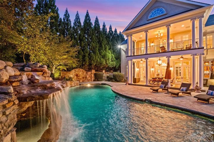 Resort style pool with grotto spa.