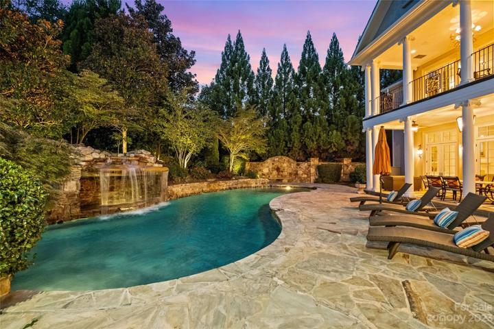 Resort style pool with grotto spa.