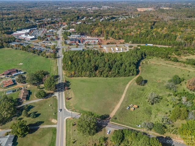8+ Acres in Downtown Waxhaw ready for commercial Development. HWY 16 Road frontage. Centrally Located by all amenities, stores, and businesses.